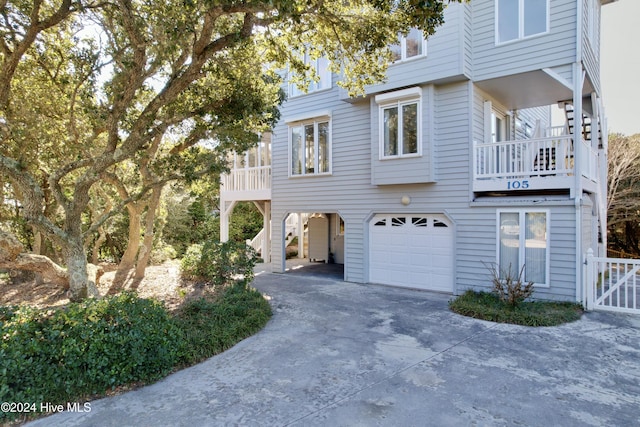 view of side of home with a garage