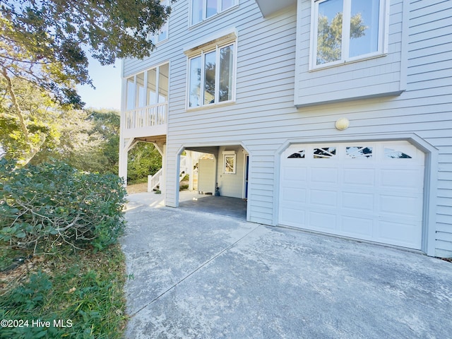 view of side of property featuring a garage