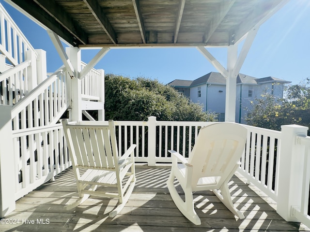 wooden balcony featuring a wooden deck