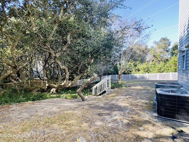 view of yard featuring central AC unit