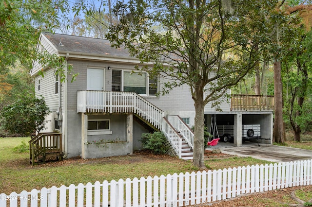 view of front facade with a carport