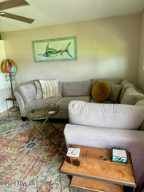 living room featuring ceiling fan