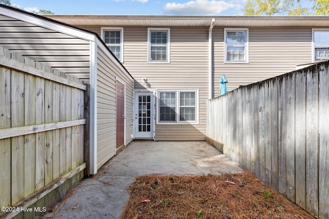 rear view of house featuring a patio