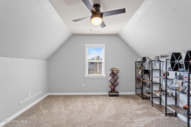 additional living space featuring carpet flooring, ceiling fan, and lofted ceiling