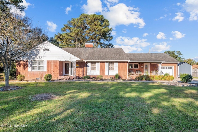 ranch-style house with a front yard and a garage