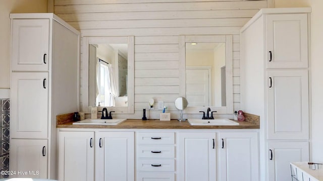 bathroom with vanity and wooden ceiling