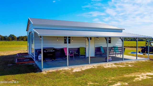 view of car parking with a lawn