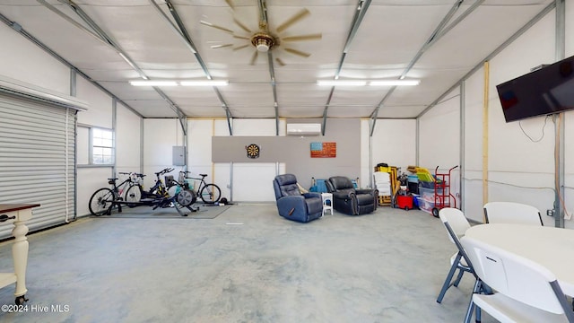 garage with electric panel and ceiling fan