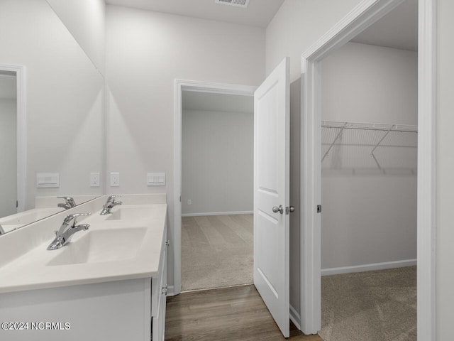 63 N Atlantic Ave Lot 143, Wilmington, NC 28411 - full bath featuring a sink, wood finished floors, toilet, and a shower stall