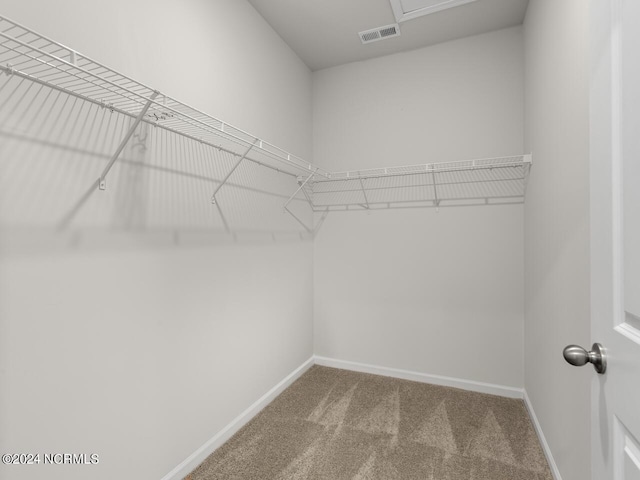 63 N Atlantic Ave Lot 143, Wilmington, NC 28411 - bathroom featuring a walk in closet, visible vents, a sink, baseboards, and recessed lighting