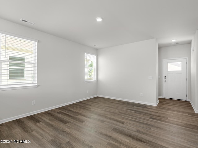 63 N Atlantic Ave Lot 143, Wilmington, NC 28411 - unfurnished living room with a sink, baseboards, recessed lighting, and dark wood-type flooring