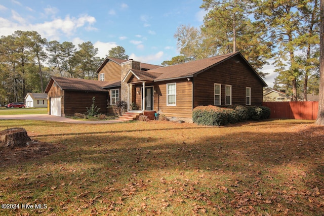 view of front of home with a front yard