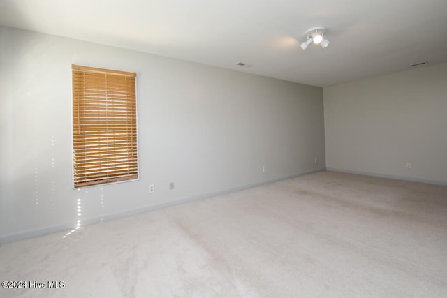 empty room featuring carpet