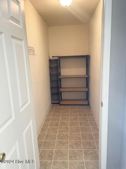 interior space with tile patterned floors