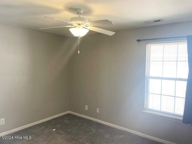 empty room with ceiling fan