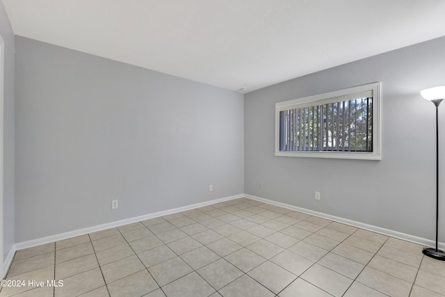 view of tiled spare room