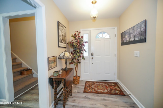 entrance foyer with light hardwood / wood-style flooring