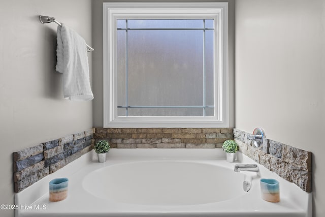 bathroom featuring a bath
