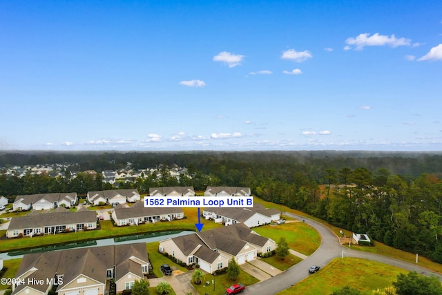 1562 Palmina Loop, Myrtle Beach, SC 29588 - aerial view of residential area with a heavily wooded area