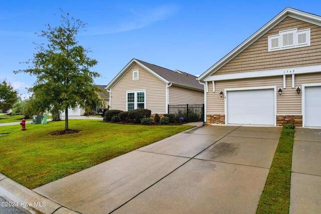 1562 Palmina Loop, Myrtle Beach, SC 29588 - view of front of home featuring stone siding and driveway