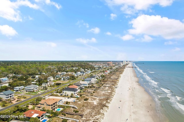 bird's eye view featuring a view of the beach and a water view