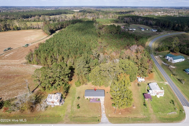 birds eye view of property featuring a rural view