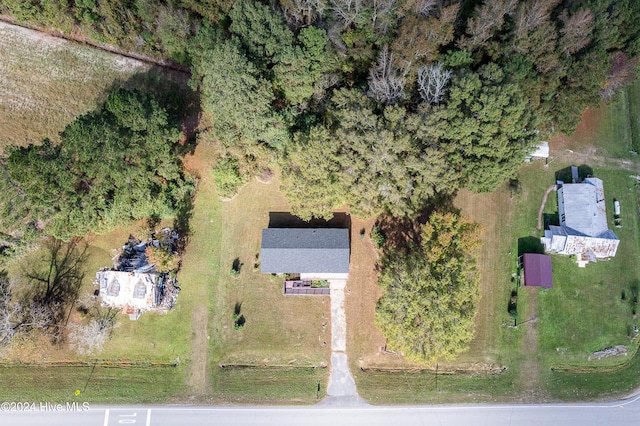 birds eye view of property with a rural view