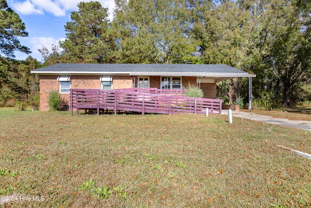 ranch-style house with a front lawn