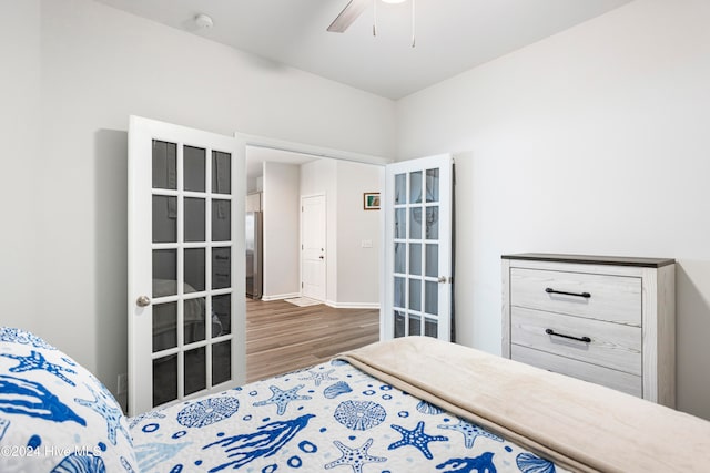 bedroom featuring wood-type flooring and ceiling fan