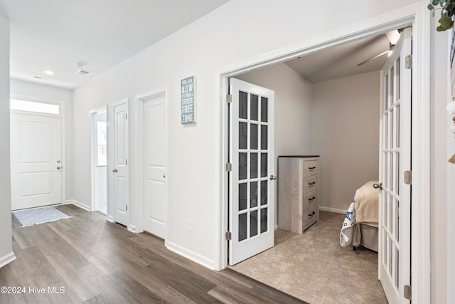 interior space featuring french doors and wood-type flooring