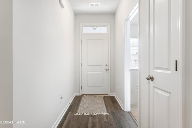 doorway featuring dark hardwood / wood-style flooring