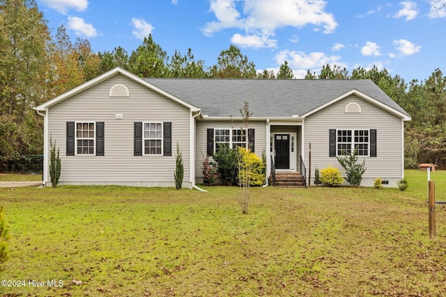 ranch-style house with a front yard