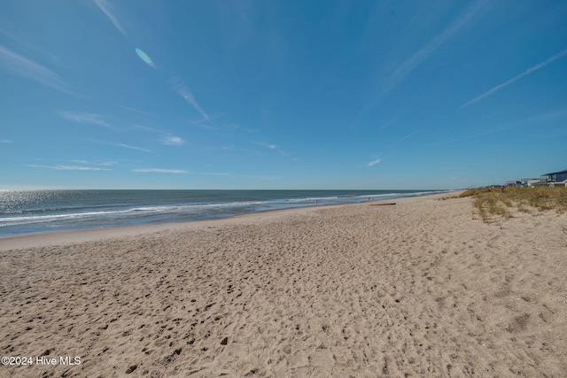 property view of water featuring a view of the beach