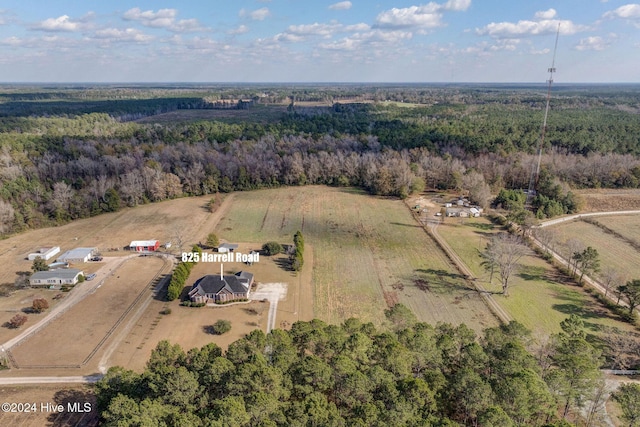 birds eye view of property featuring a rural view