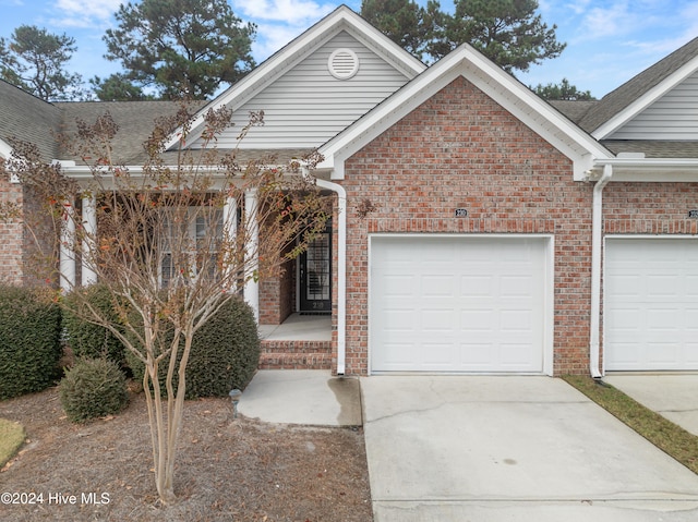 view of front of home with a garage