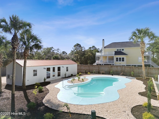 view of swimming pool featuring a fenced backyard, a fenced in pool, and a patio