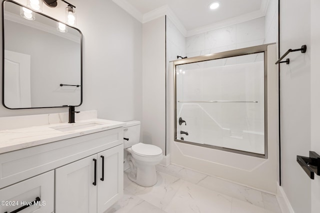 full bathroom featuring toilet, combined bath / shower with glass door, ornamental molding, and vanity