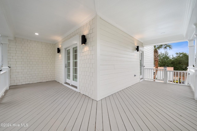 wooden deck with french doors