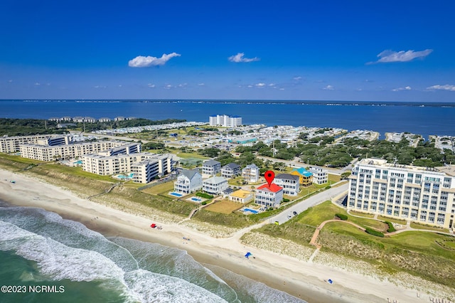 aerial view featuring a water view and a beach view