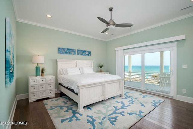 bedroom featuring ornamental molding, a water view, and access to exterior