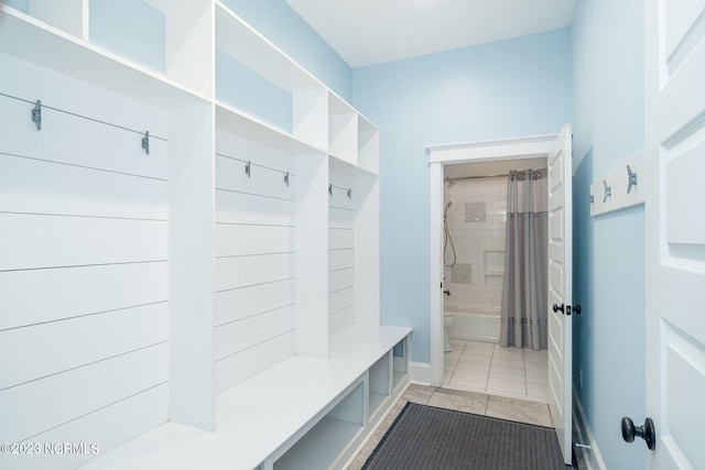 mudroom featuring light tile patterned flooring