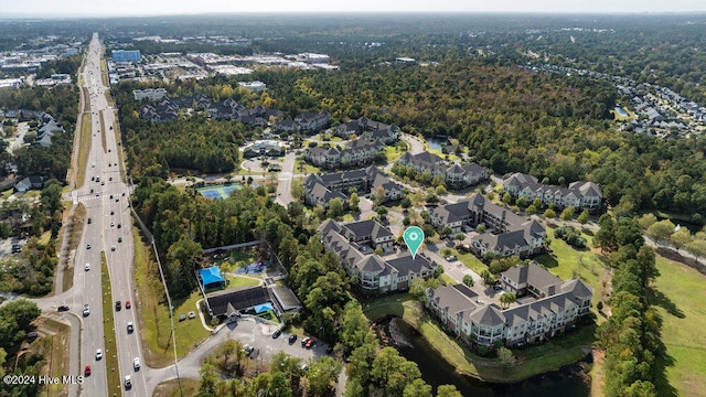 birds eye view of property with a residential view