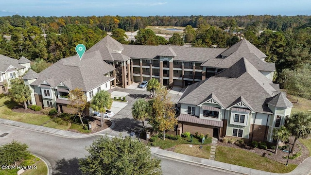 bird's eye view featuring a view of trees