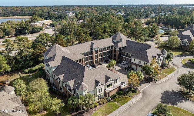 bird's eye view featuring a forest view