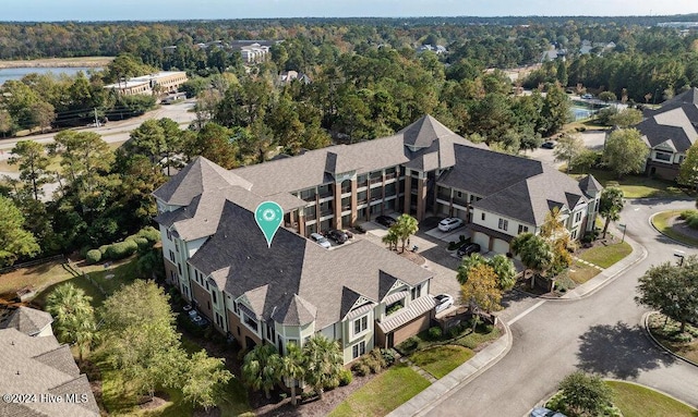 aerial view featuring a view of trees