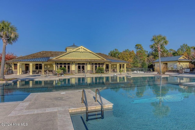 community pool with a patio