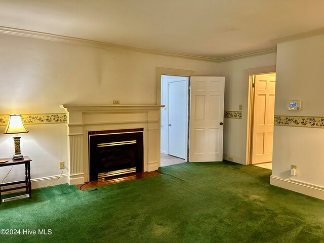 unfurnished living room with carpet flooring and ornamental molding