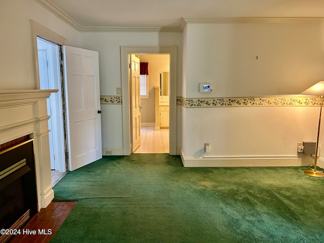 interior space featuring dark colored carpet and crown molding