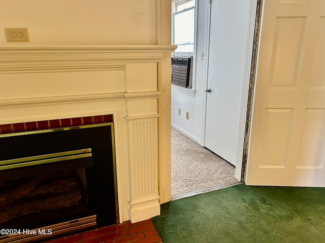 interior details featuring carpet flooring and cooling unit