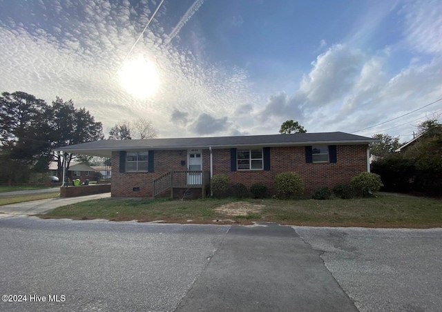 view of front facade featuring a carport